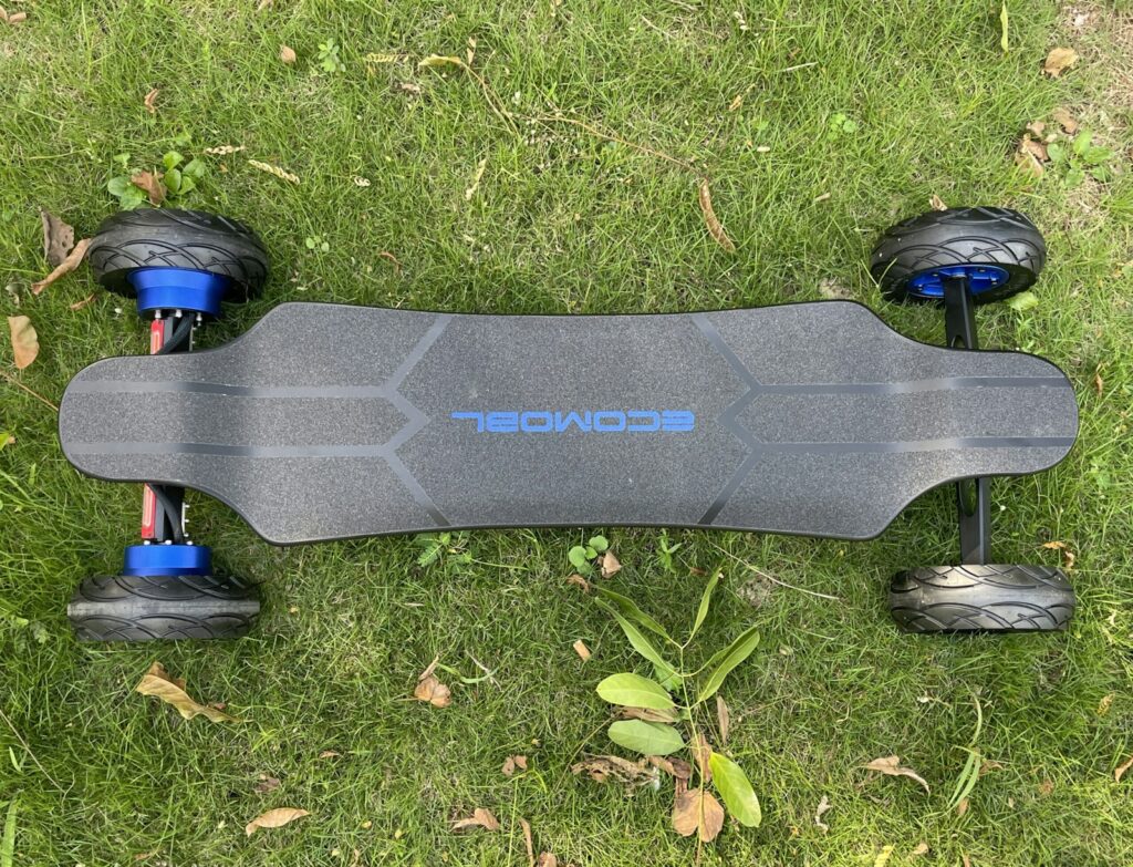 Electric longboard with motor and battery enclosure