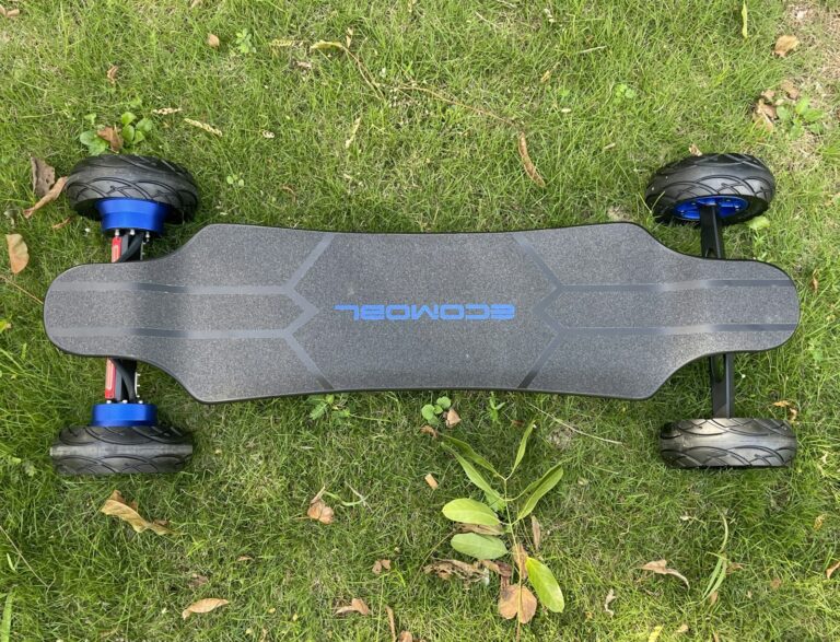 Electric longboard with motor and battery enclosure