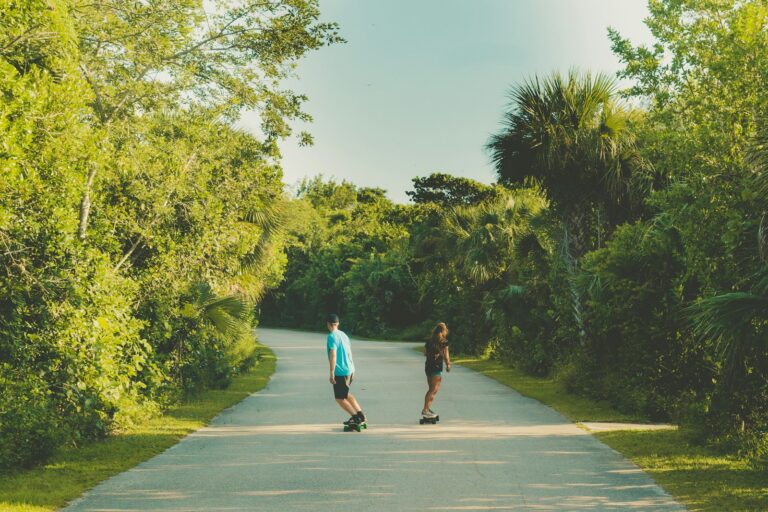 Two riders cruising on longboards