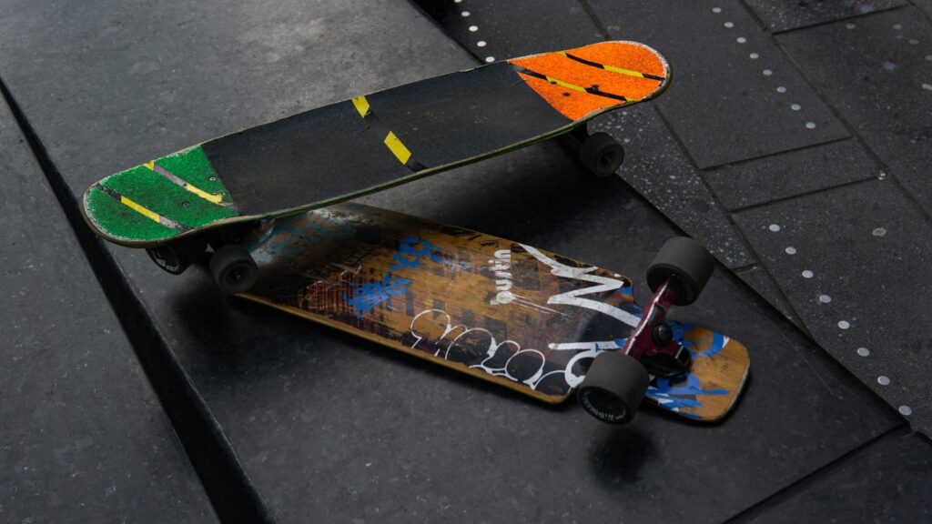 Two different longboards side by side